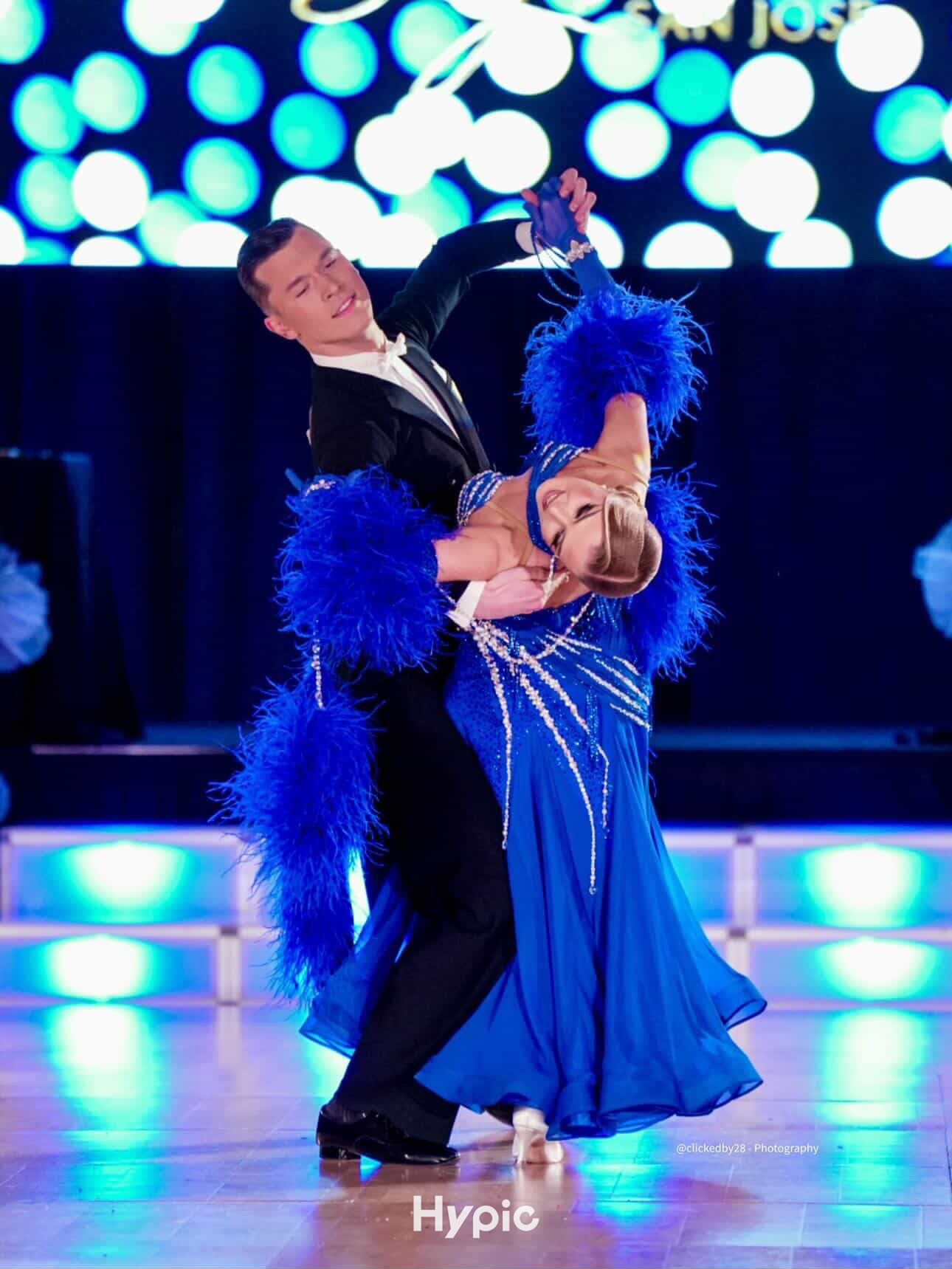 Professional ballroom dance couple performing